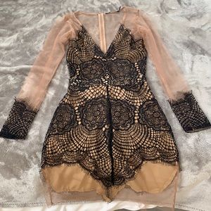 ‘For Love and Lemons’ black lace mini dress.